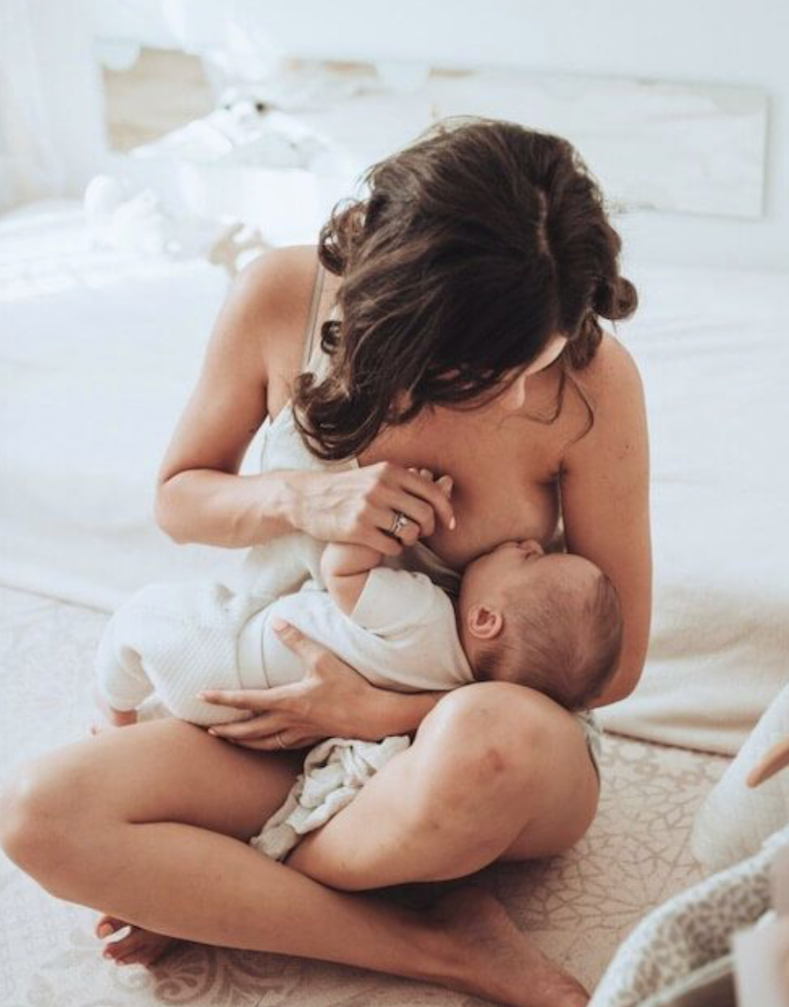 Woman breastfeeding her baby