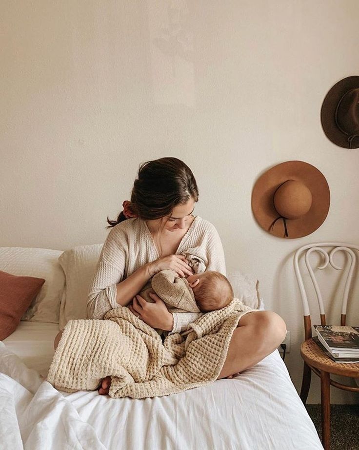 a mother breastfeeding her child