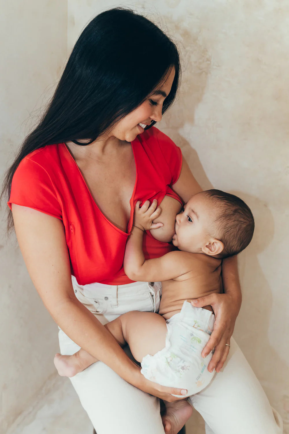 Mother breastfeeding her baby