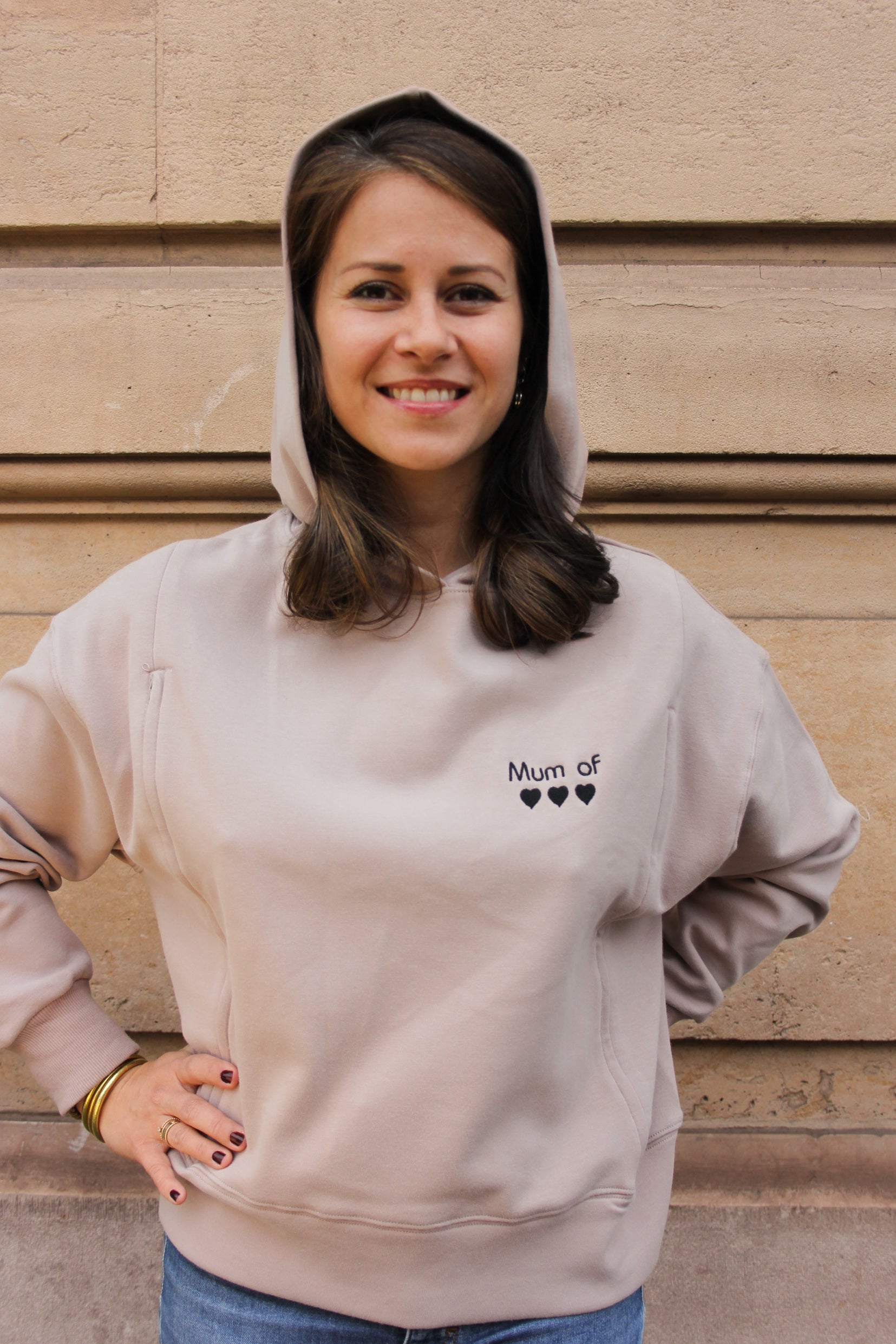 Taupe hooded nursing sweater with zippered side openings, customizable with hearts to match the number of children.