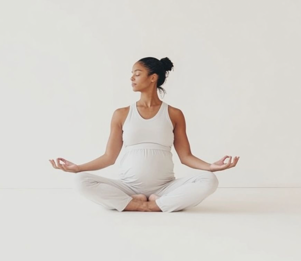photograph of a woman practicing postnatal yoga