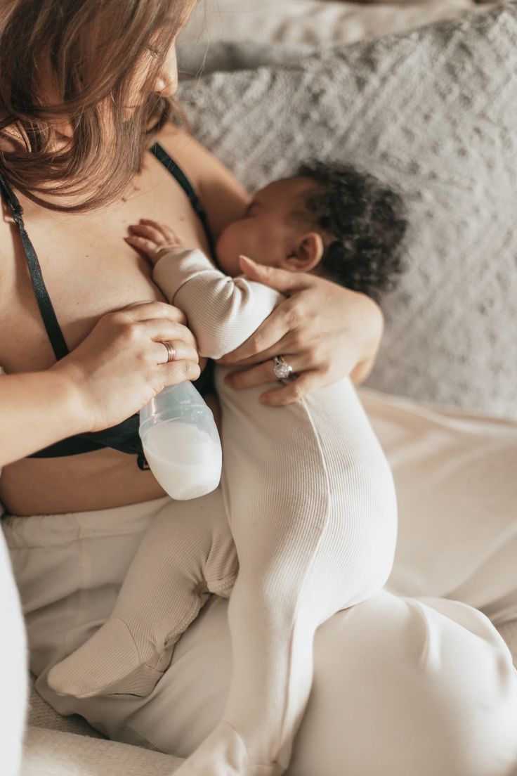 Mom is breastfeeding her baby 